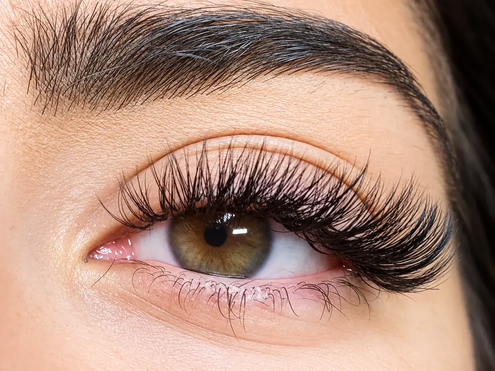 Close up of one client's eye with a full set of lash extensions.